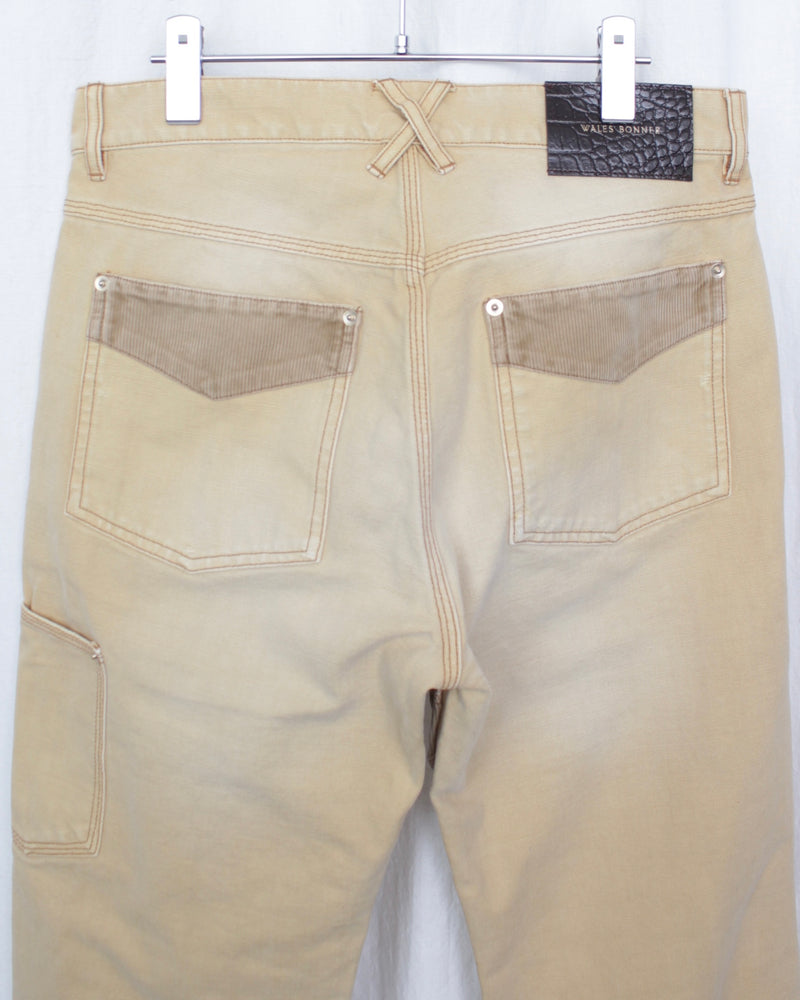 WALES BONNER / SIERRA TROUSER - Sand /
Brown (UA25DE12-CO01-800)